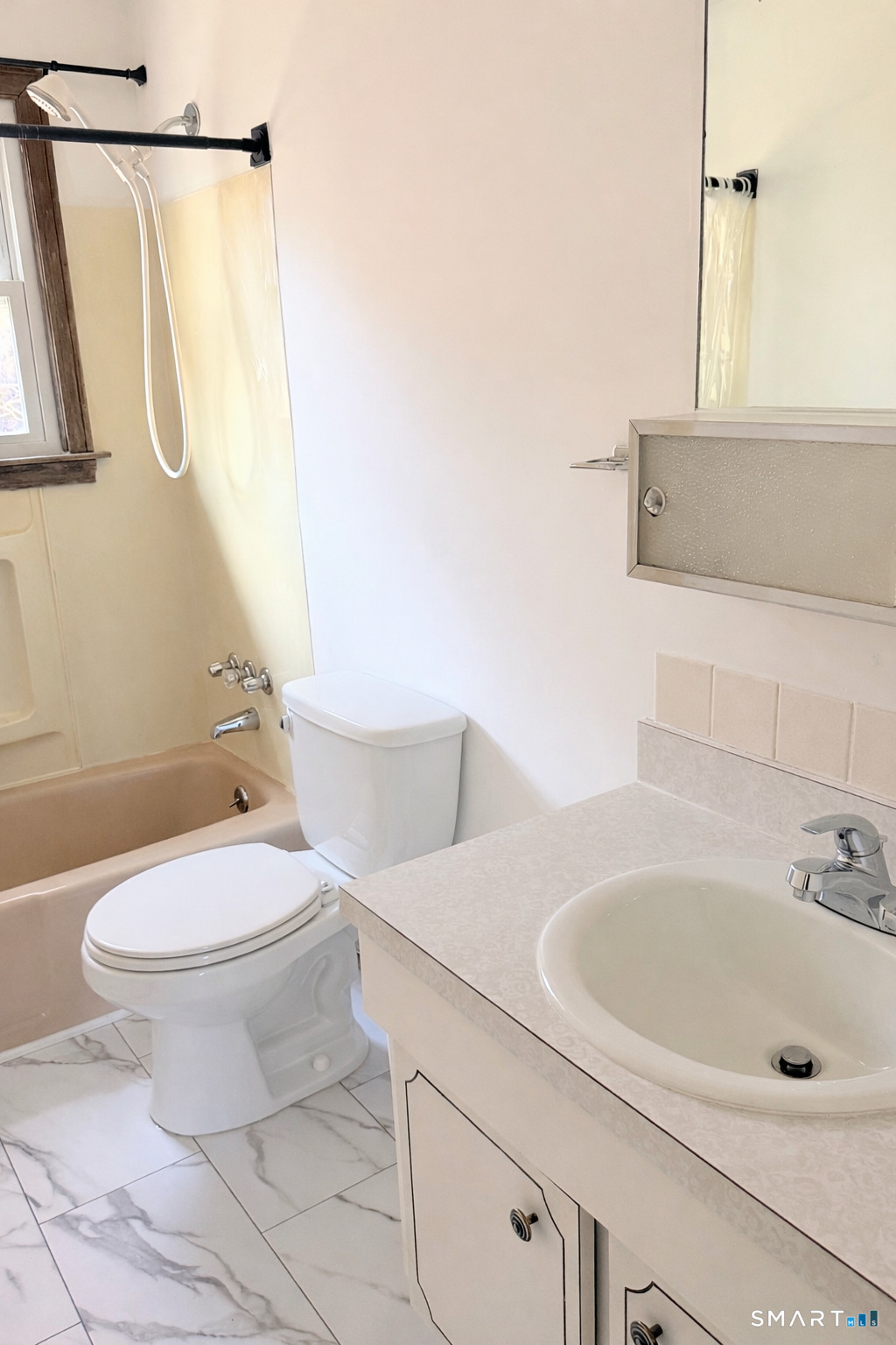 195 Wall Street Hebron, CT 06248 - Photo 9 of 23 a bathroom with a sink a toilet and shower