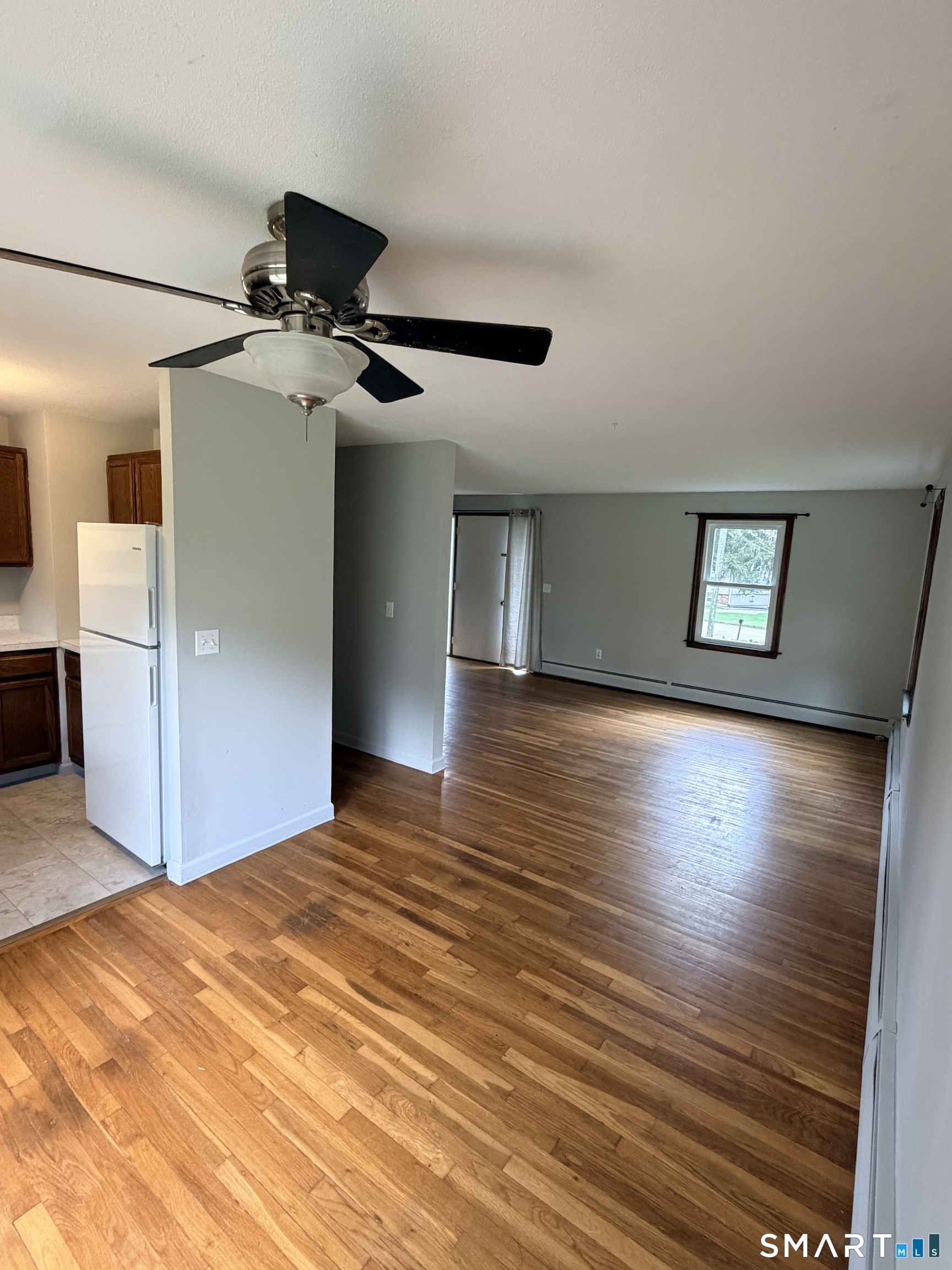 195 Wall Street Hebron, CT 06248 - Photo 10 of 23 a view of empty room with wooden floor