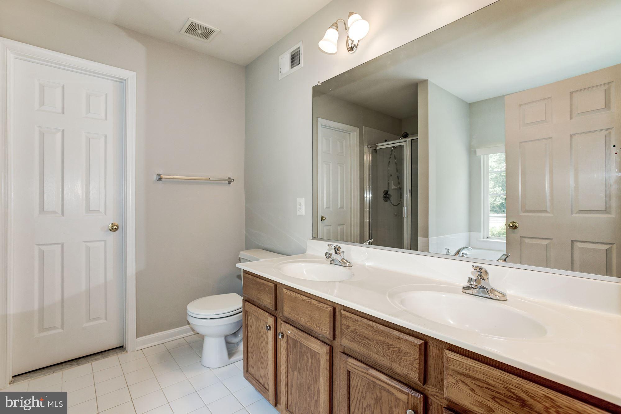 9535 North Laurel Road Laurel, MD 20723 - Photo 20 of 49 Primary Bedroom Suite Bath