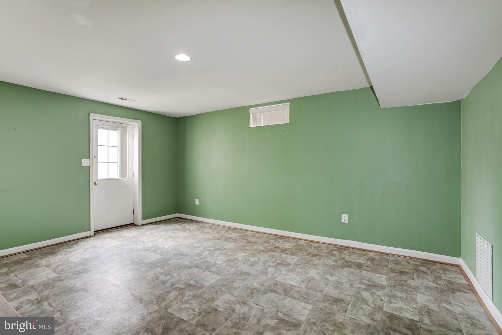 9535 North Laurel Road Laurel, MD 20723 - Photo 34 of 49 Lower Level Recreation Room | Access to Rear Yard