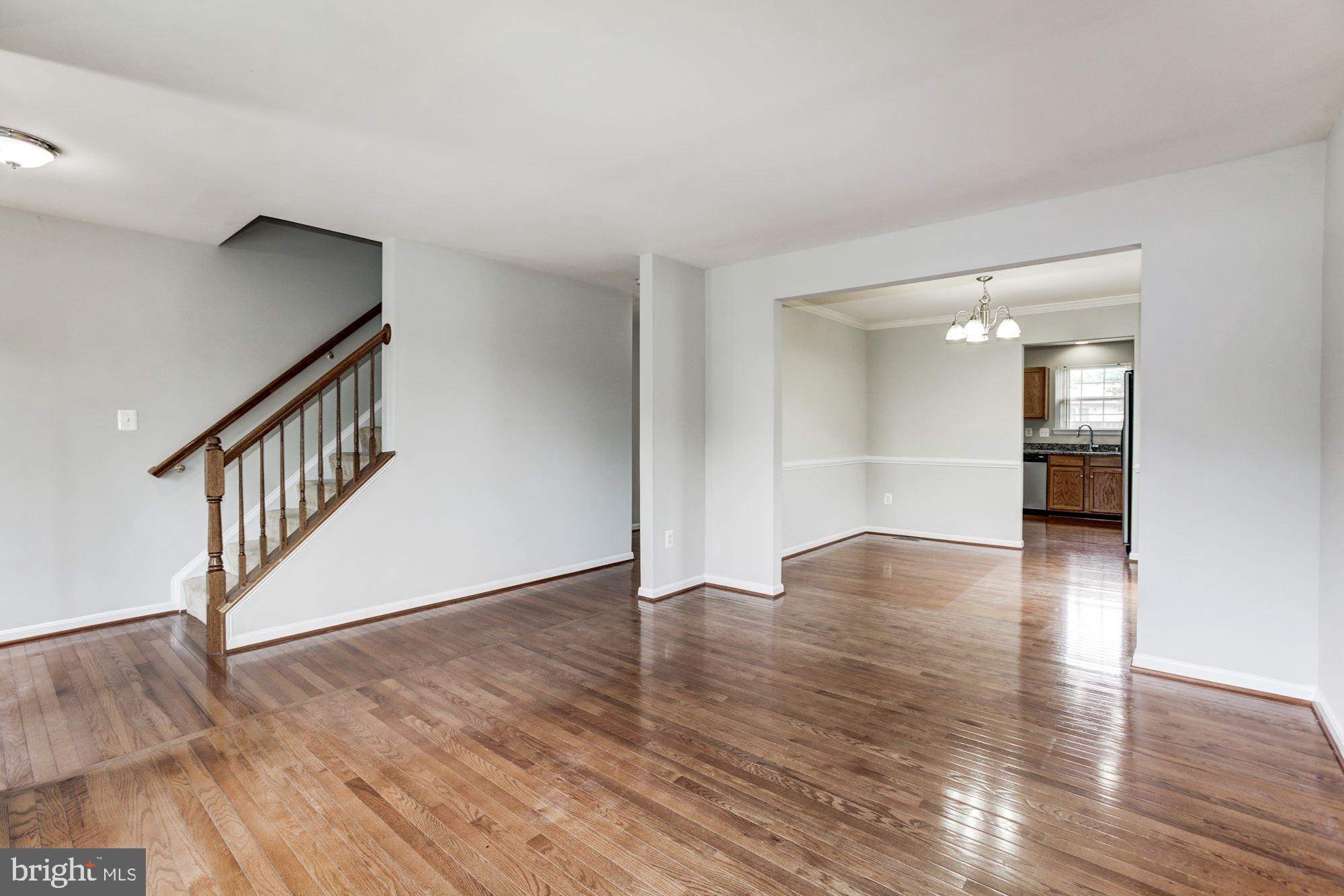 9535 North Laurel Road Laurel, MD 20723 - Photo 7 of 49 Living Room | Dining Room | Hardwood Floors
