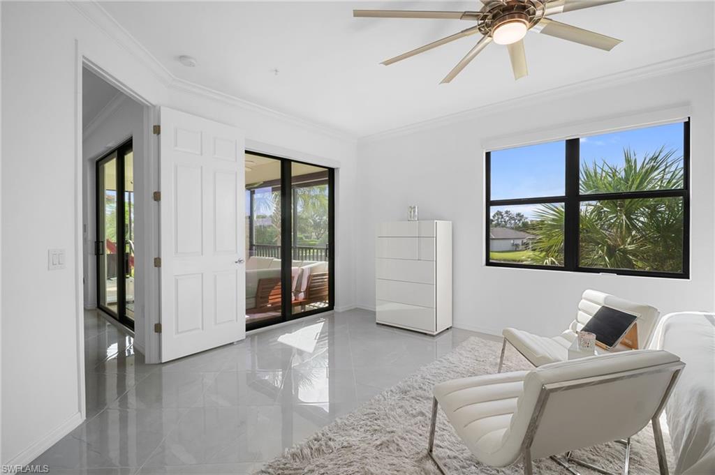 11879 Arboretum Run Drive, Unit 201 Fort Myers, FL 33913 - Photo 24 of 37 Sitting room featuring ornamental molding and ceiling fan