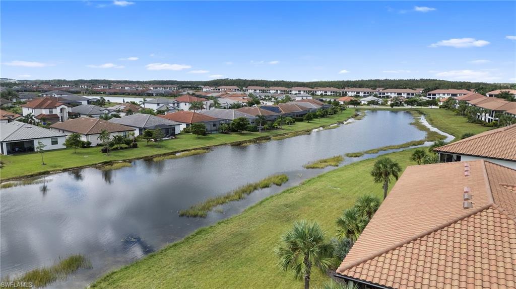 11879 Arboretum Run Drive, Unit 201 Fort Myers, FL 33913 - Photo 37 of 37 Aerial view of residential area featuring a nearby body of water