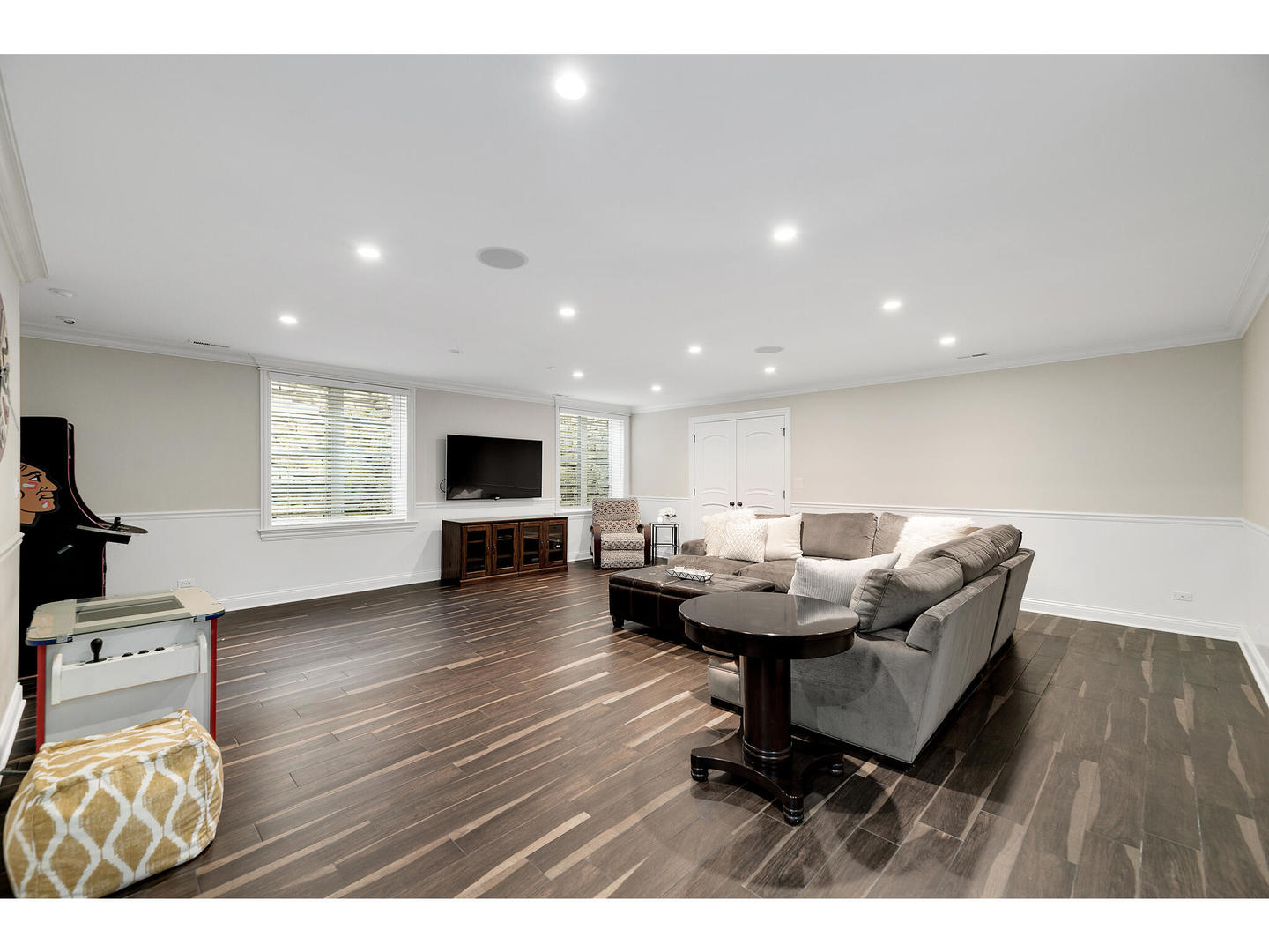728 Cleveland Road Hinsdale, IL 60521 - Photo 28 of 35 a living room with furniture and a flat screen tv