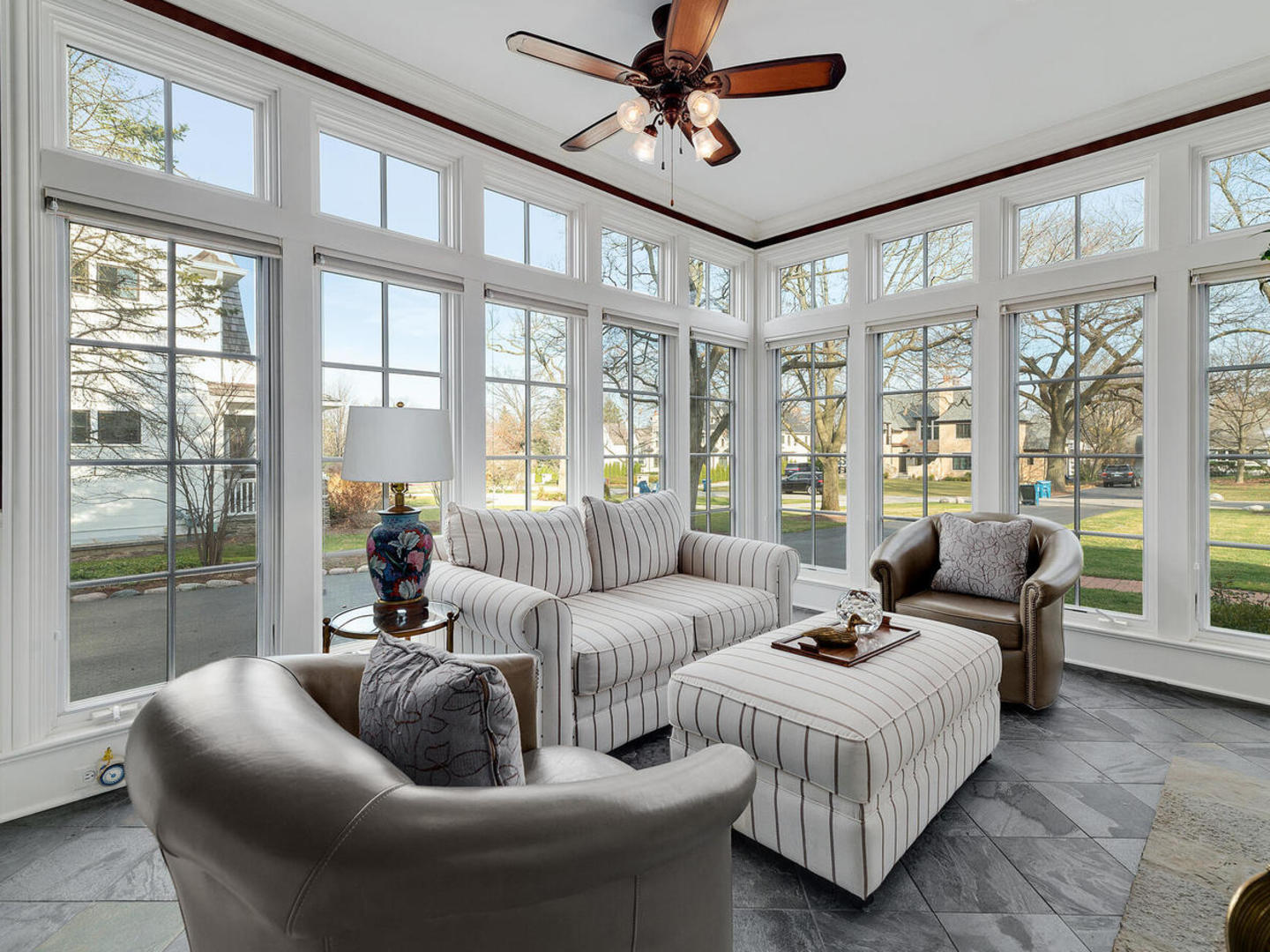 728 Cleveland Road Hinsdale, IL 60521 - Photo 7 of 35 a living room with furniture and large windows