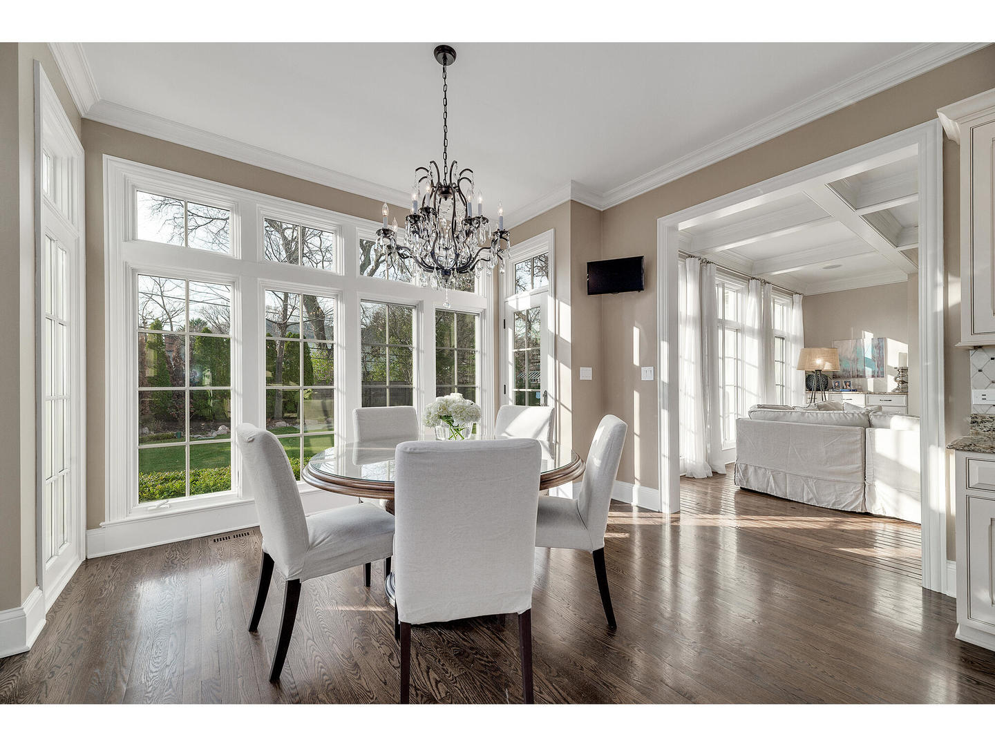 728 Cleveland Road Hinsdale, IL 60521 - Photo 10 of 35 a view of a dining room with furniture wooden floor and chandelier