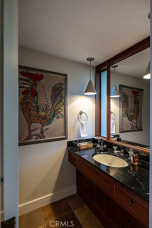 2751 Toxey Drive Raleigh, NC 27609 - Photo 13 of 41 a bathroom with a sink and a mirror