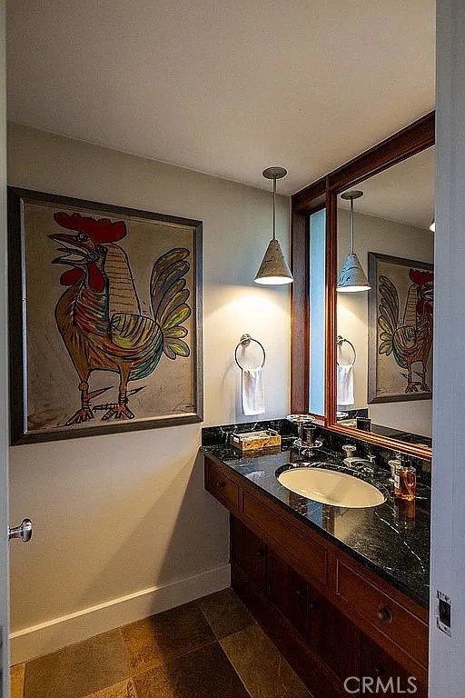 2751 Toxey Drive Raleigh, NC 27609 - Photo 14 of 41 a bathroom with a sink and a mirror