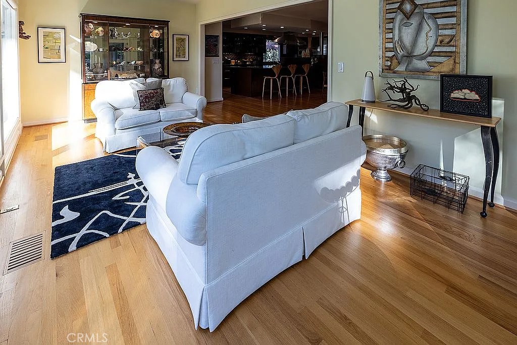 2751 Toxey Drive Raleigh, NC 27609 - Photo 15 of 41 a living room with furniture and a flat screen tv