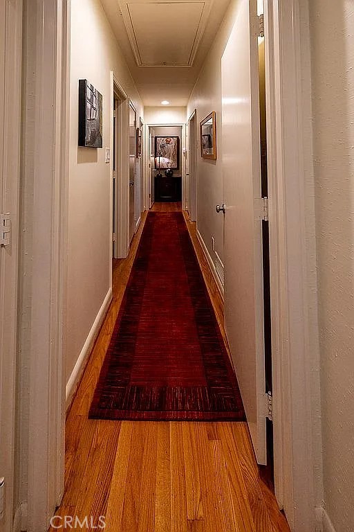 2751 Toxey Drive Raleigh, NC 27609 - Photo 17 of 41 a hallway with wooden floor windows and entryway