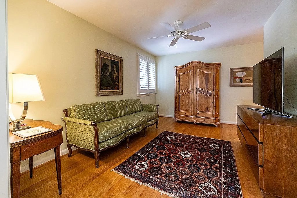 2751 Toxey Drive Raleigh, NC 27609 - Photo 21 of 41 a living room with furniture and a flat screen tv