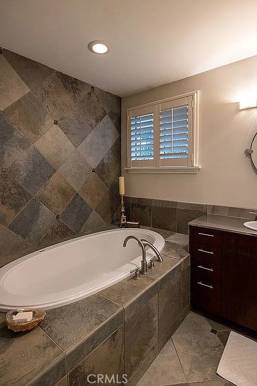 2751 Toxey Drive Raleigh, NC 27609 - Photo 24 of 41 a bathroom with a bathtub and a sink