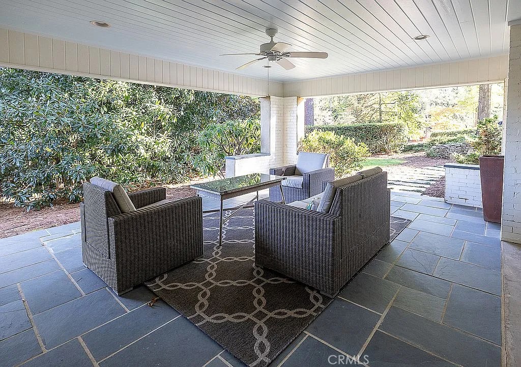 2751 Toxey Drive Raleigh, NC 27609 - Photo 34 of 41 a living room with furniture and a large window