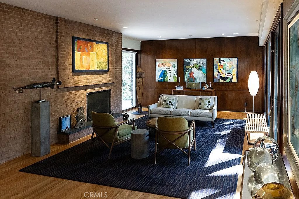 2751 Toxey Drive Raleigh, NC 27609 - Photo 6 of 41 a living room with furniture and a fireplace