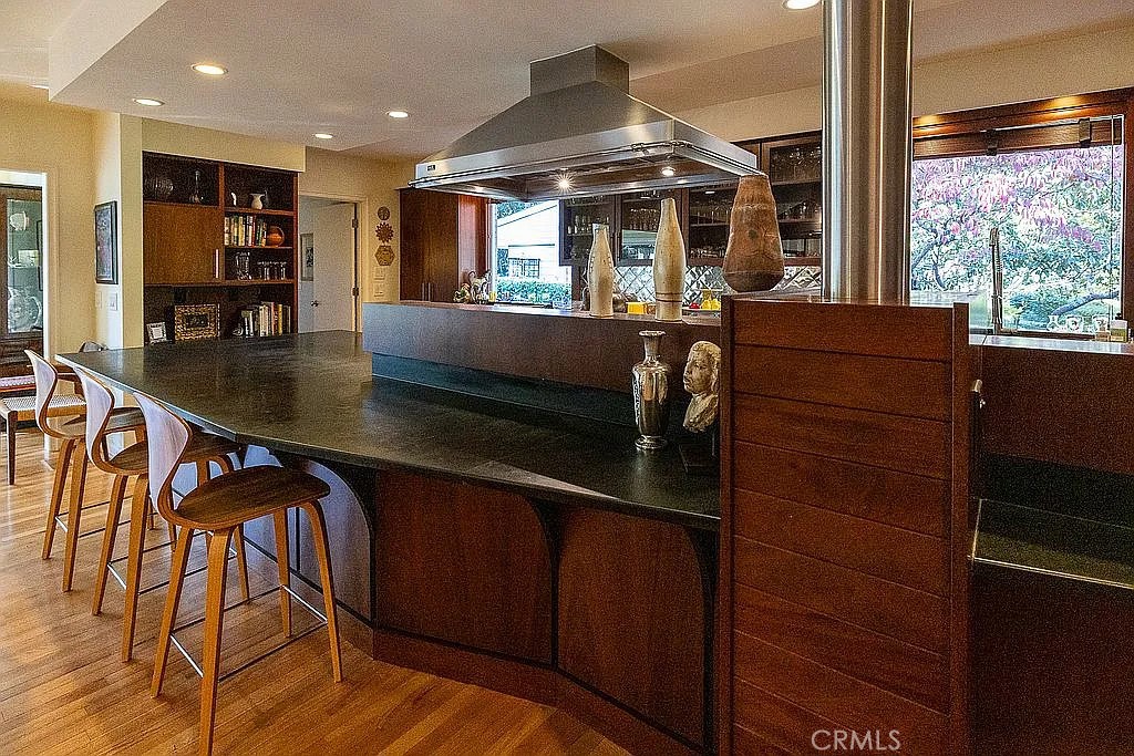 2751 Toxey Drive Raleigh, NC 27609 - Photo 10 of 41 a view of a living room and kitchen with a large window