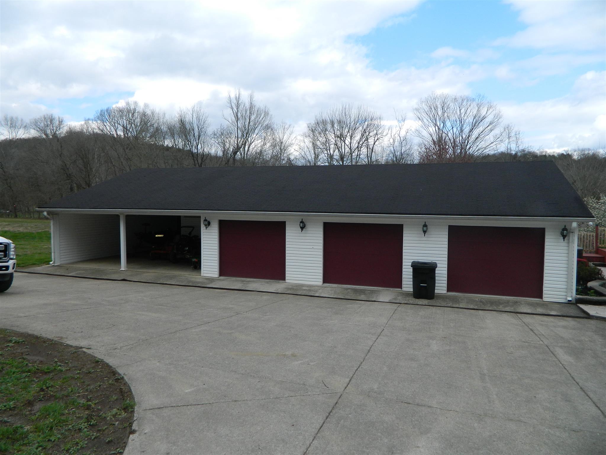 491 Pee Dee Branch Road Cottontown, TN 37048 - Photo 14 of 30 a front view of a house with yard