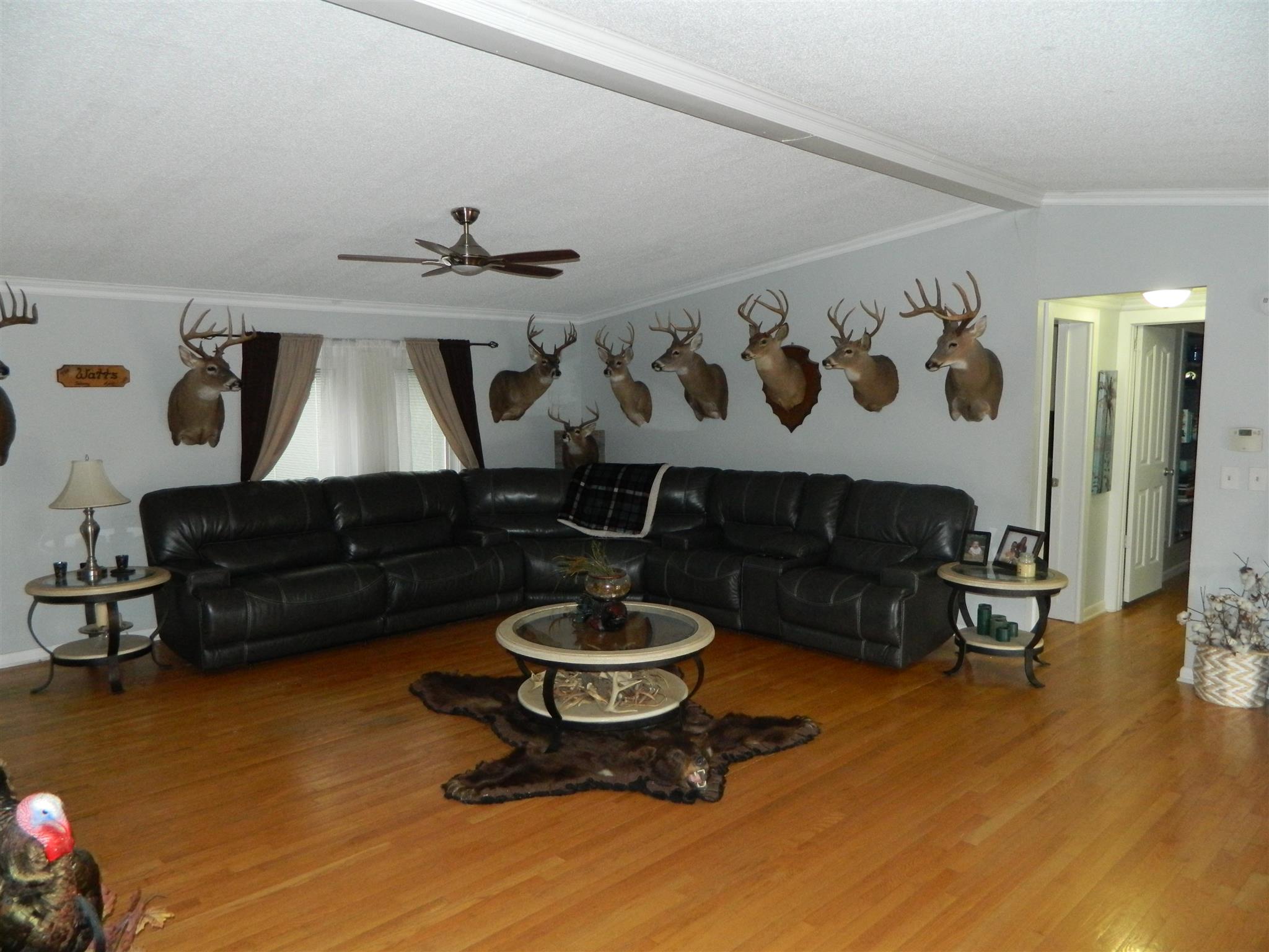 491 Pee Dee Branch Road Cottontown, TN 37048 - Photo 22 of 30 a living room with furniture and a wooden floor
