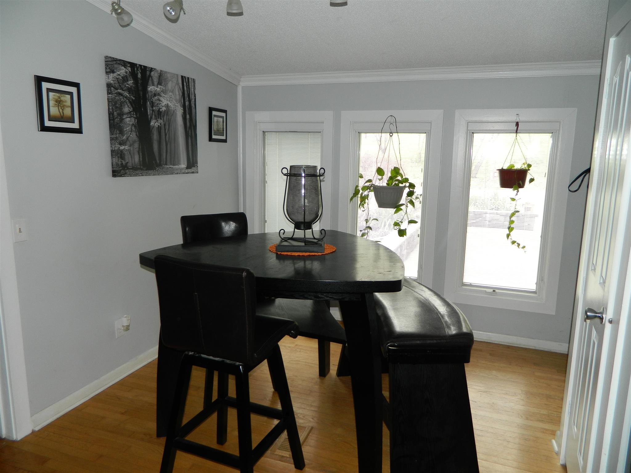 491 Pee Dee Branch Road Cottontown, TN 37048 - Photo 25 of 30 a view of a dining room with furniture and window
