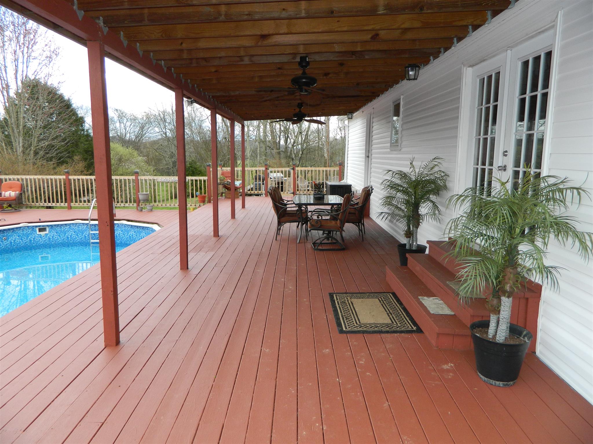 491 Pee Dee Branch Road Cottontown, TN 37048 - Photo 4 of 30 a view of a patio with swimming pool