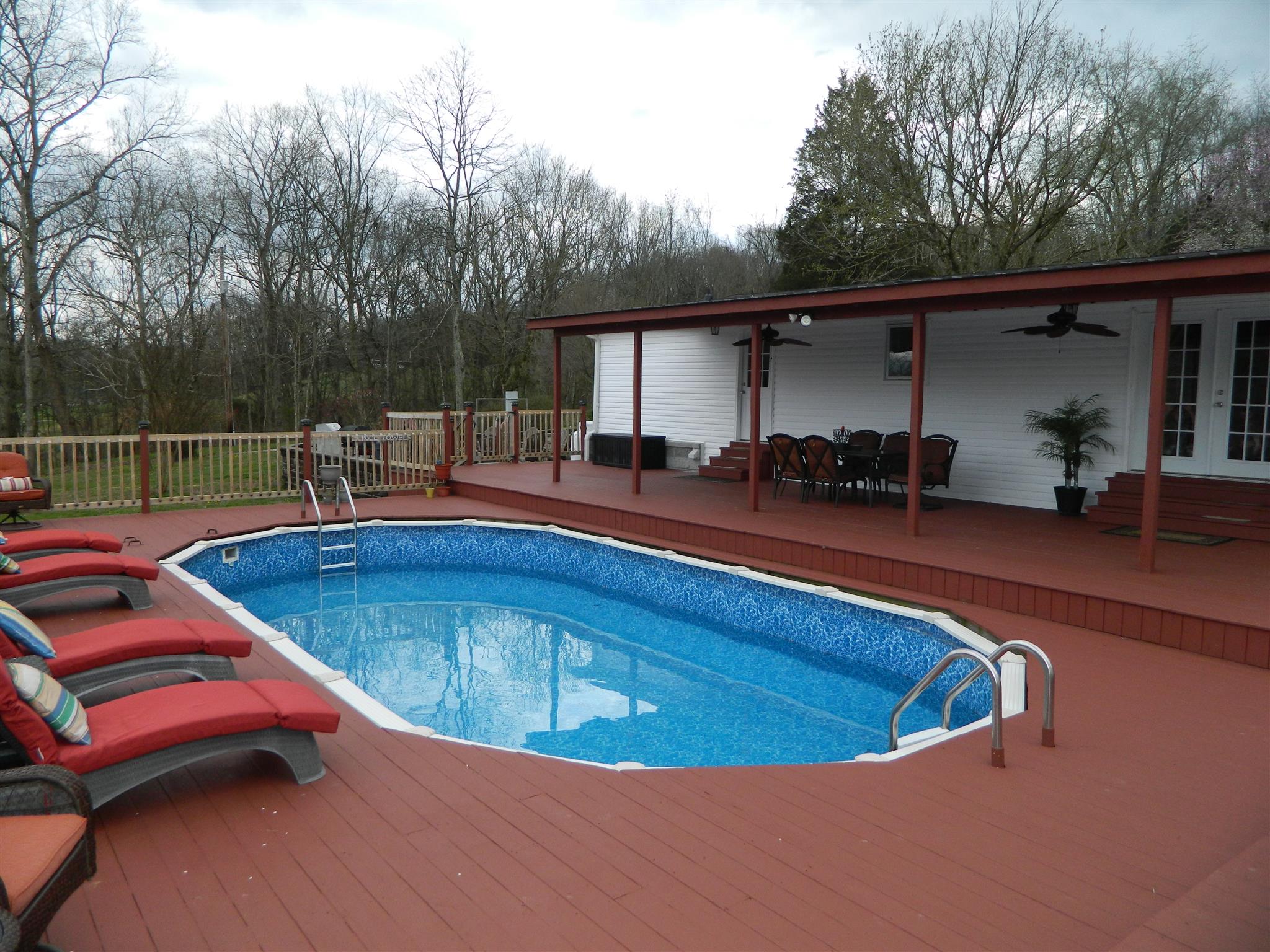 491 Pee Dee Branch Road Cottontown, TN 37048 - Photo 6 of 30 a view of swimming pool with chairs