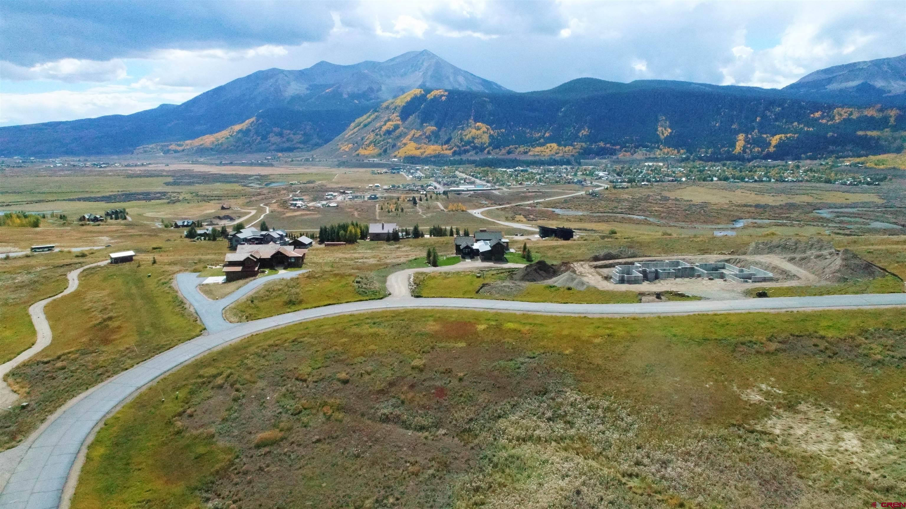 375 Saddle Ridge Ranch Road Crested Butte, CO 81224 - Photo 2 of 12 a view of a swimming pool with a mountain