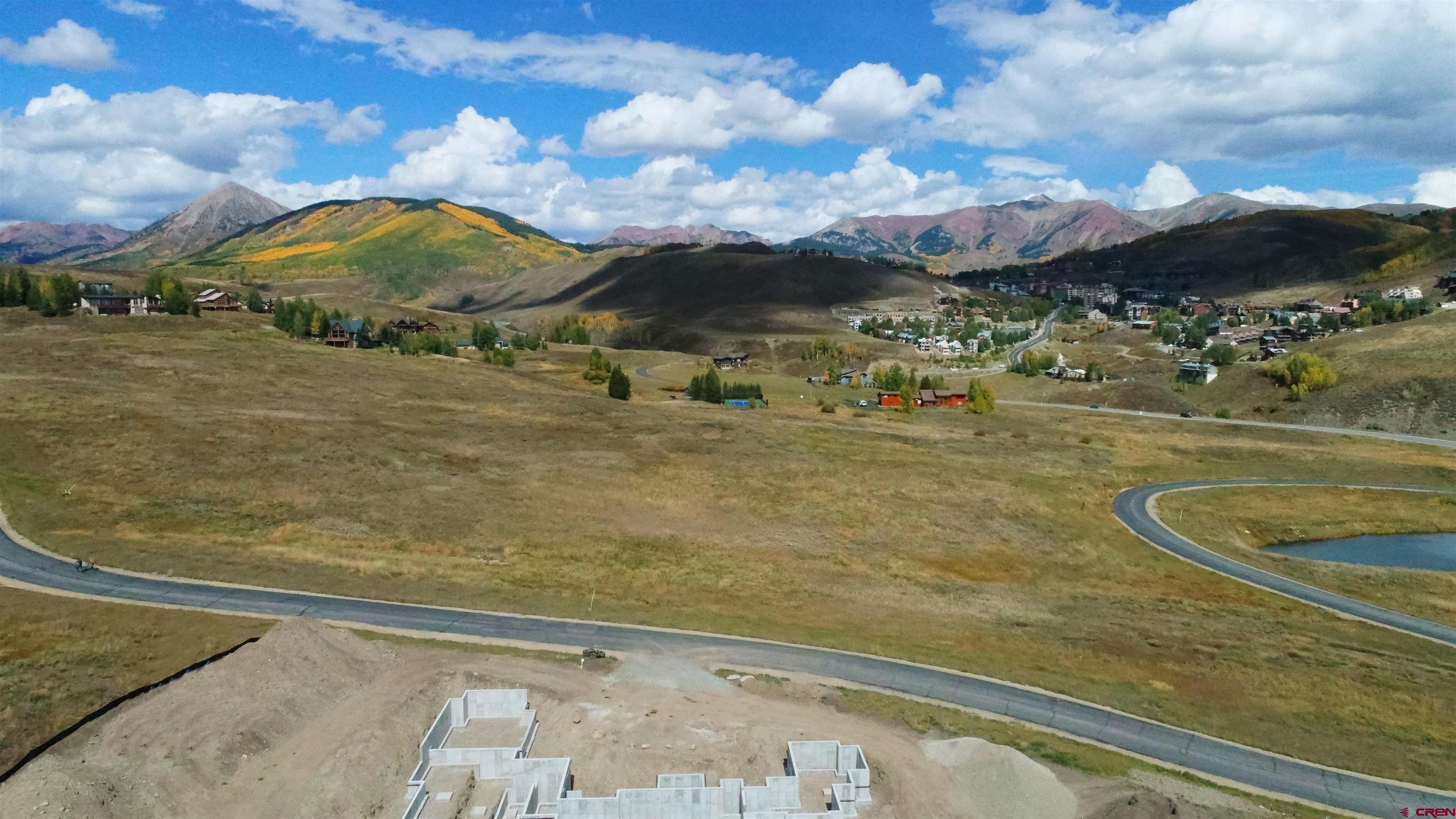 375 Saddle Ridge Ranch Road Crested Butte, CO 81224 - Photo 9 of 12 a view of a swimming pool with a yard