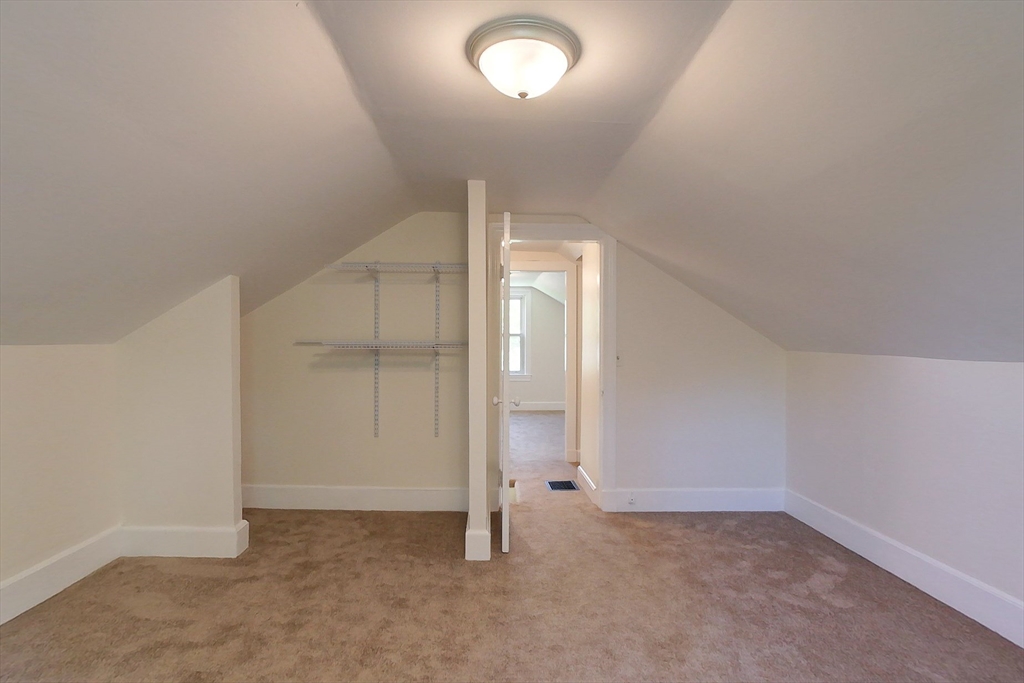 92 Squannacook Road Shirley, MA 01464 - Photo 21 of 38 an empty room with closet and windows