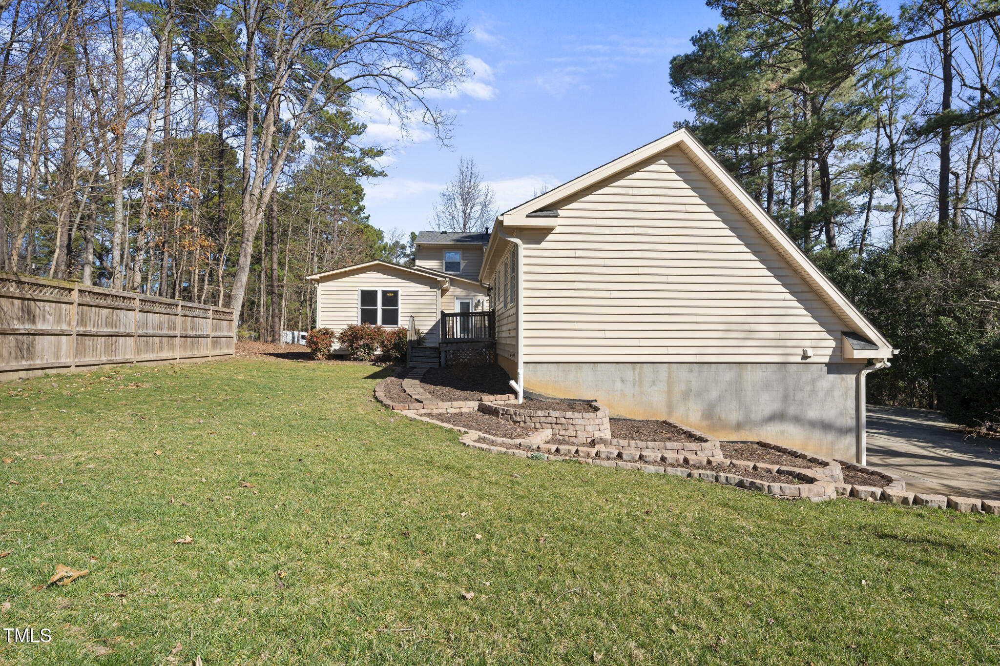 6301 King Lawrence Road Raleigh, NC 27607 - Photo 9 of 79 a view of a house with a yard