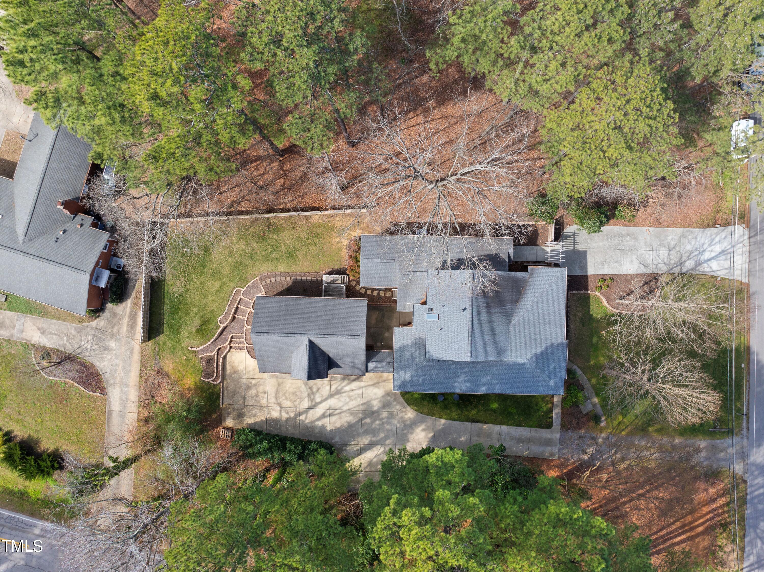 6301 King Lawrence Road Raleigh, NC 27607 - Photo 10 of 79 an aerial view of a house with a yard and large tree