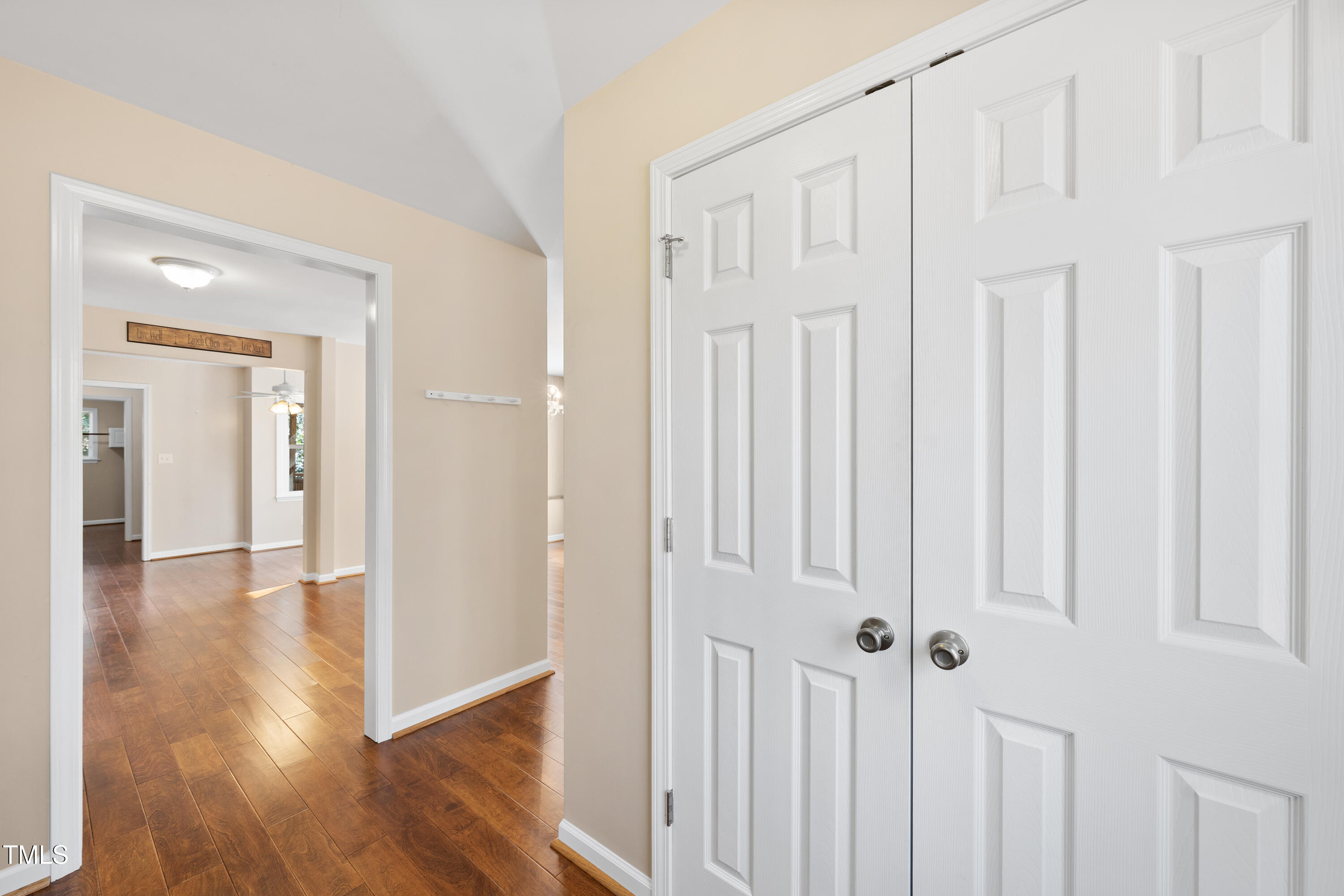 6301 King Lawrence Road Raleigh, NC 27607 - Photo 11 of 79 a view of a hallway with wooden floor