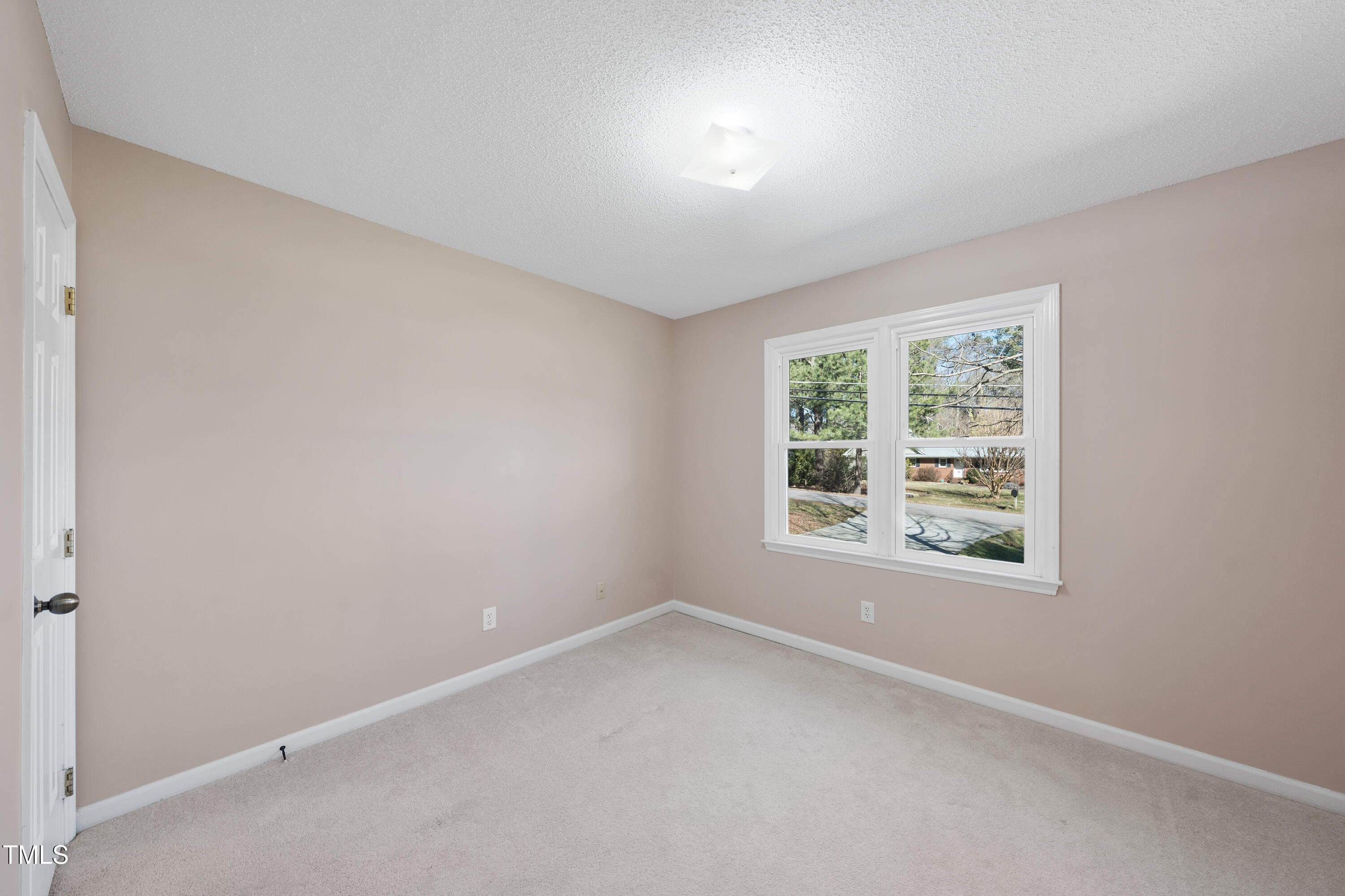 6301 King Lawrence Road Raleigh, NC 27607 - Photo 34 of 79 an empty room with a window