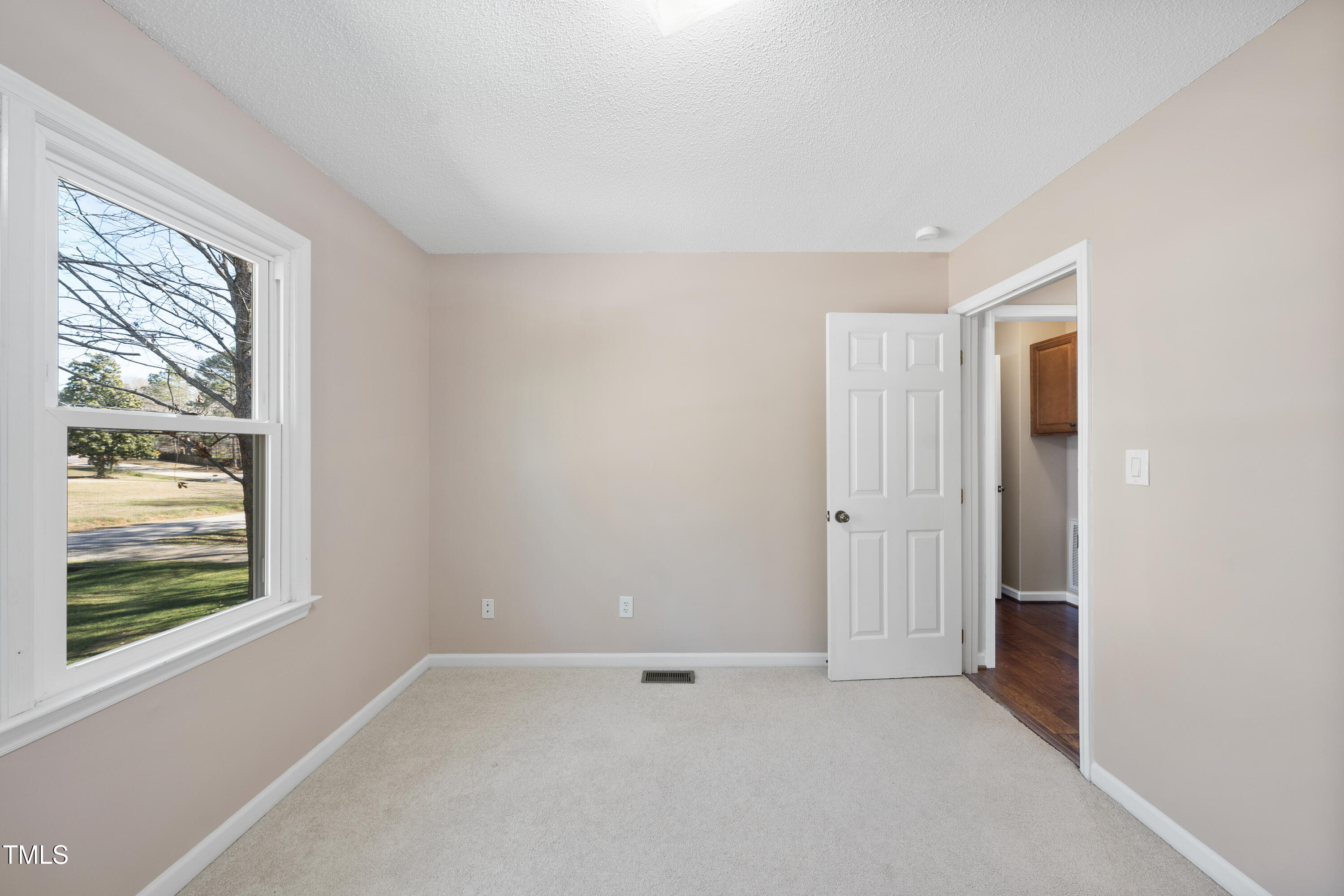 6301 King Lawrence Road Raleigh, NC 27607 - Photo 35 of 79 a view of an empty room with window