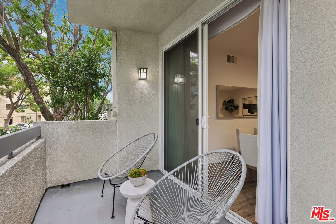 4242 Stansbury Avenue, Unit 104 Sherman Oaks, CA 91423 - Photo 13 of 38 a view of balcony and patio