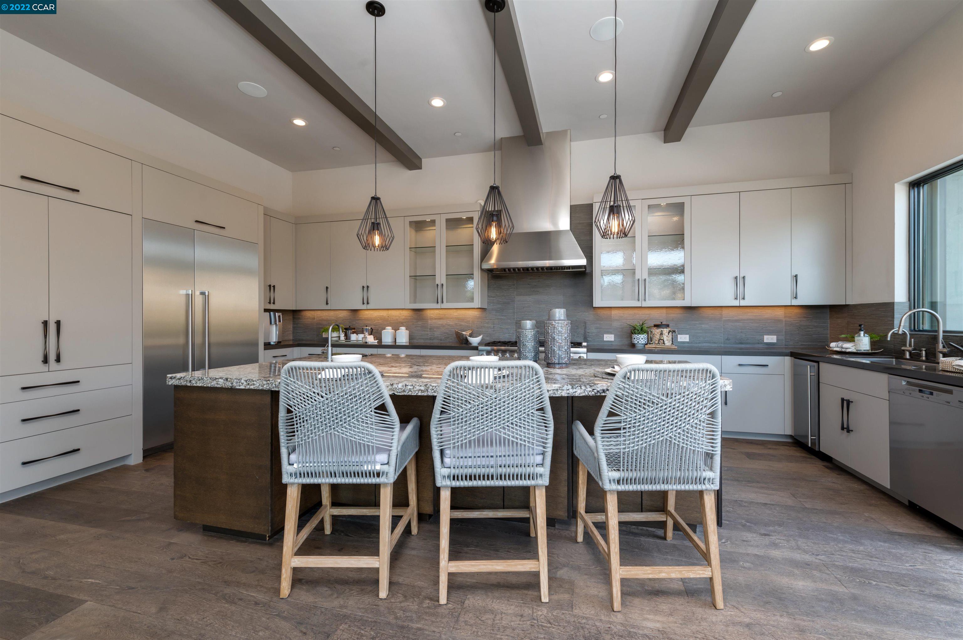 155 Arbor View Lane Lafayette, CA 94549 - Photo 20 of 32 a large kitchen with a table and chairs
