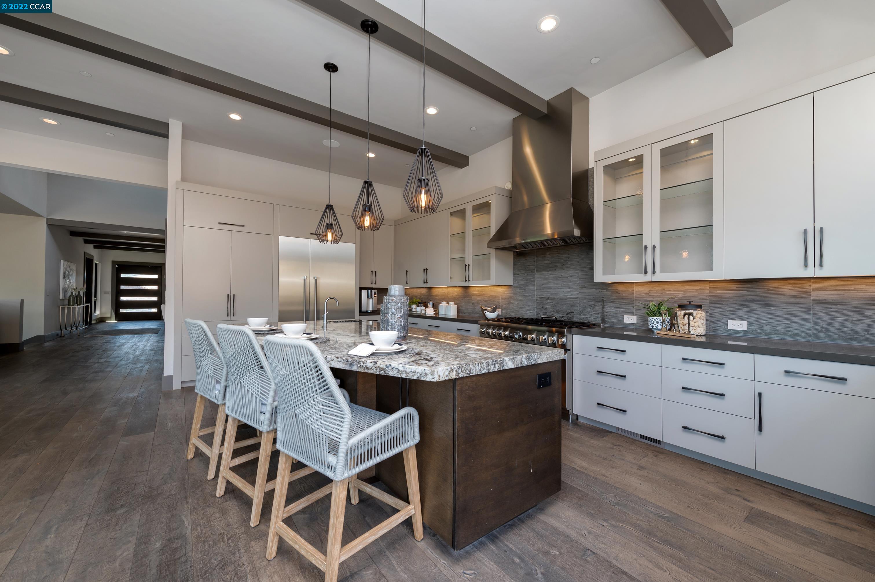 155 Arbor View Lane Lafayette, CA 94549 - Photo 21 of 32 a kitchen with stainless steel appliances granite countertop a stove and a wooden floors