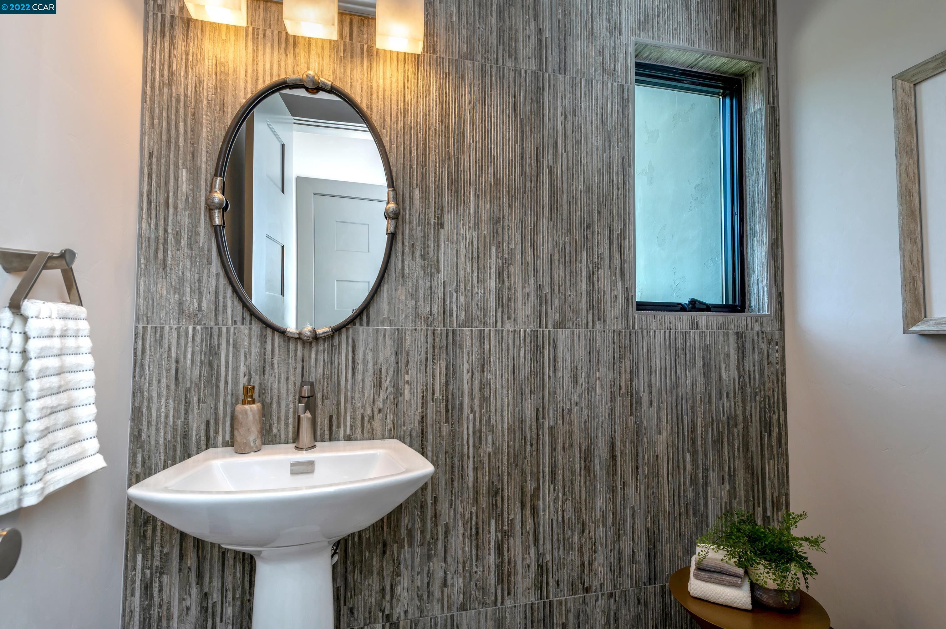 155 Arbor View Lane Lafayette, CA 94549 - Photo 23 of 32 a bathroom with a sink and a mirror