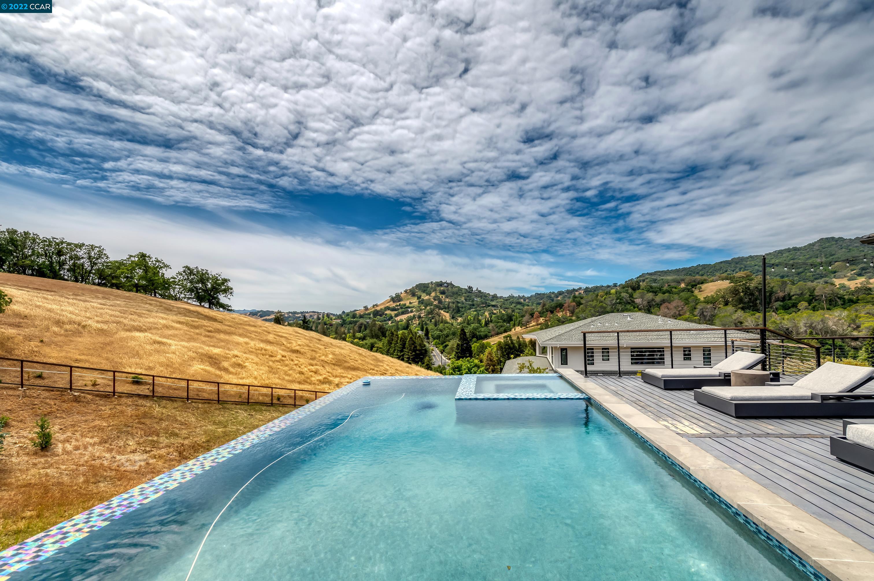 155 Arbor View Lane Lafayette, CA 94549 - Photo 28 of 32 a view of a swimming pool with an outdoor seating