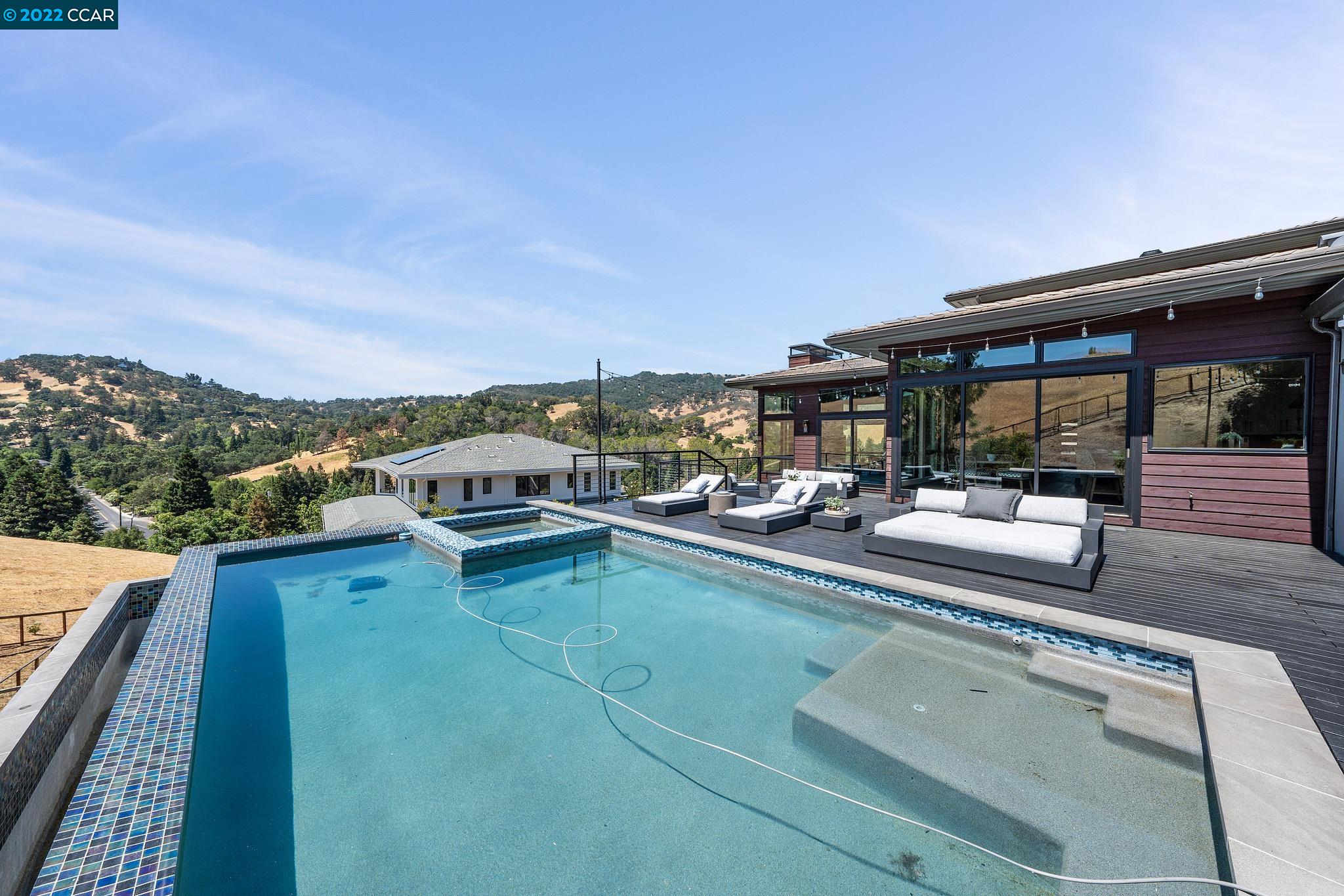 155 Arbor View Lane Lafayette, CA 94549 - Photo 4 of 32 a view of a swimming pool and lounge chair