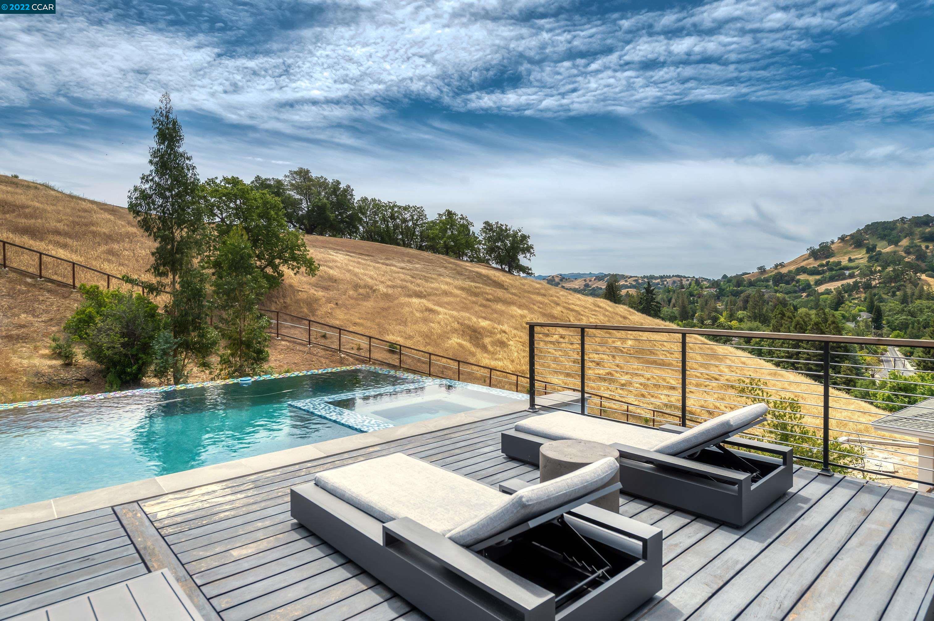 155 Arbor View Lane Lafayette, CA 94549 - Photo 9 of 32 a view of a roof deck with couches and wooden floor