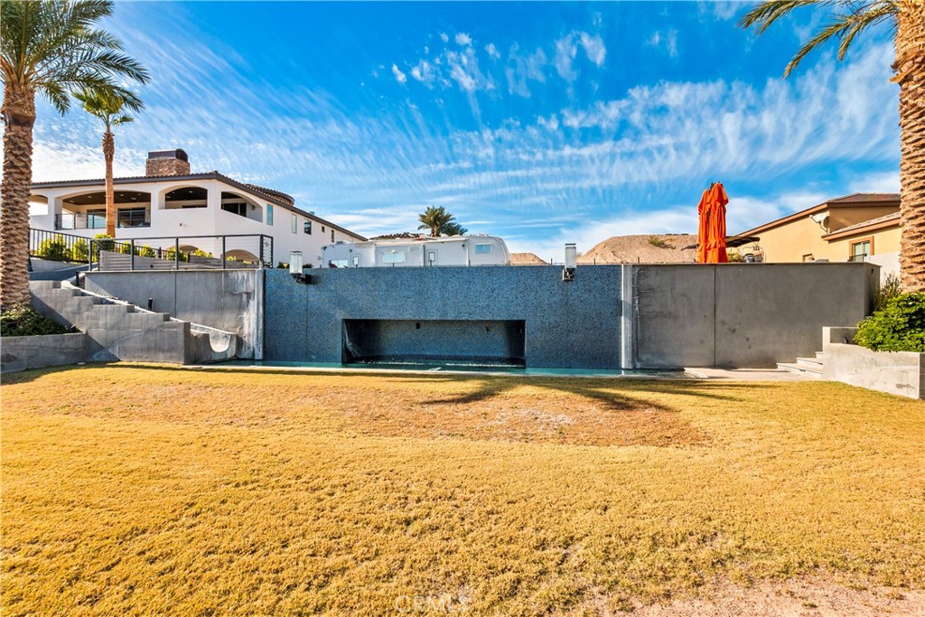 4618 My Place Road Needles, CA 92363 - Photo 13 of 31 a front view of a house with a yard