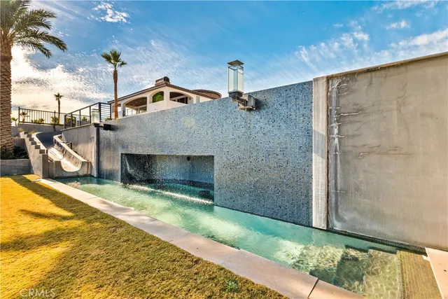 a view of a swimming pool and outdoor space