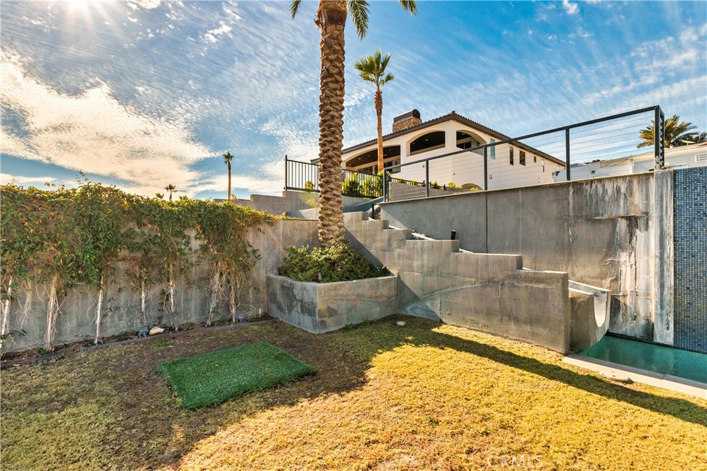 4618 My Place Road Needles, CA 92363 - Photo 17 of 31 a view of a house with backyard and trees