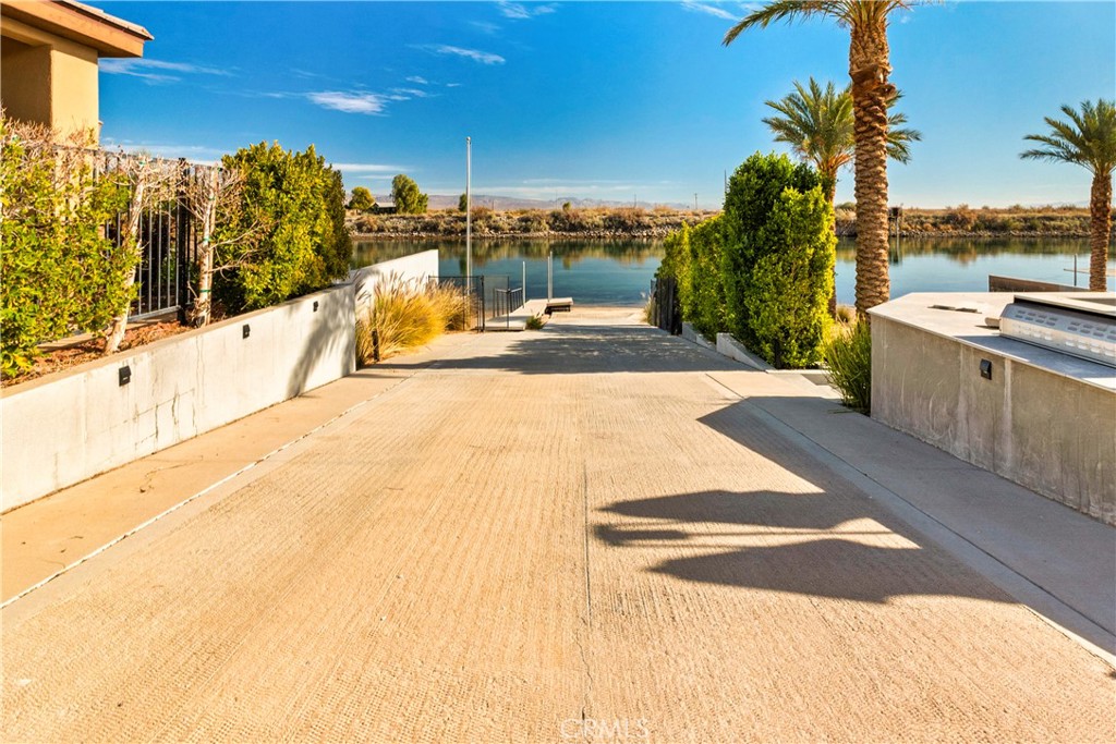 4618 My Place Road Needles, CA 92363 - Photo 20 of 31 a view of a swimming pool with a lounge chair