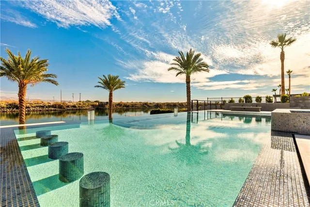 a view of a swimming pool with a patio