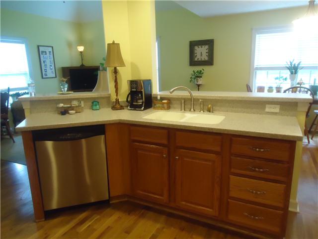 3281 Noah Road Beechgrove, TN 37018 - Photo 11 of 20 Beautiful stainless steel appliances. Here you see the built in dishwasher, the granite countertops and corian sink.