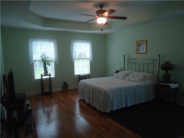 3281 Noah Road Beechgrove, TN 37018 - Photo 13 of 20 The master suite on the first floor has hardwood, trey ceiling and is 14 x 17 in size. You will be able to all of your furniture in it.