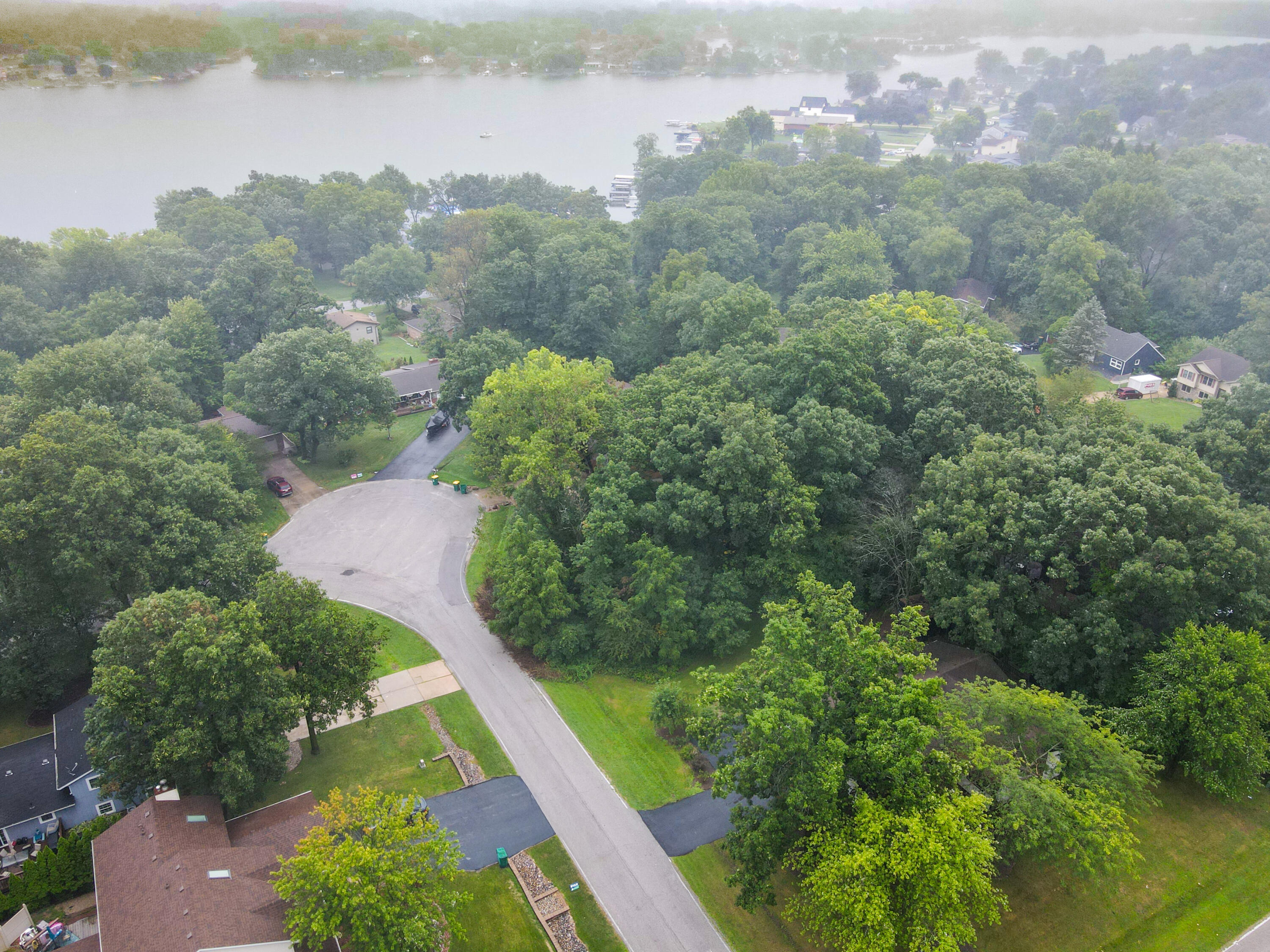 4270 Park Place Crown Point, IN 46307 - Photo 36 of 36 an aerial view of a house with a yard and lake view