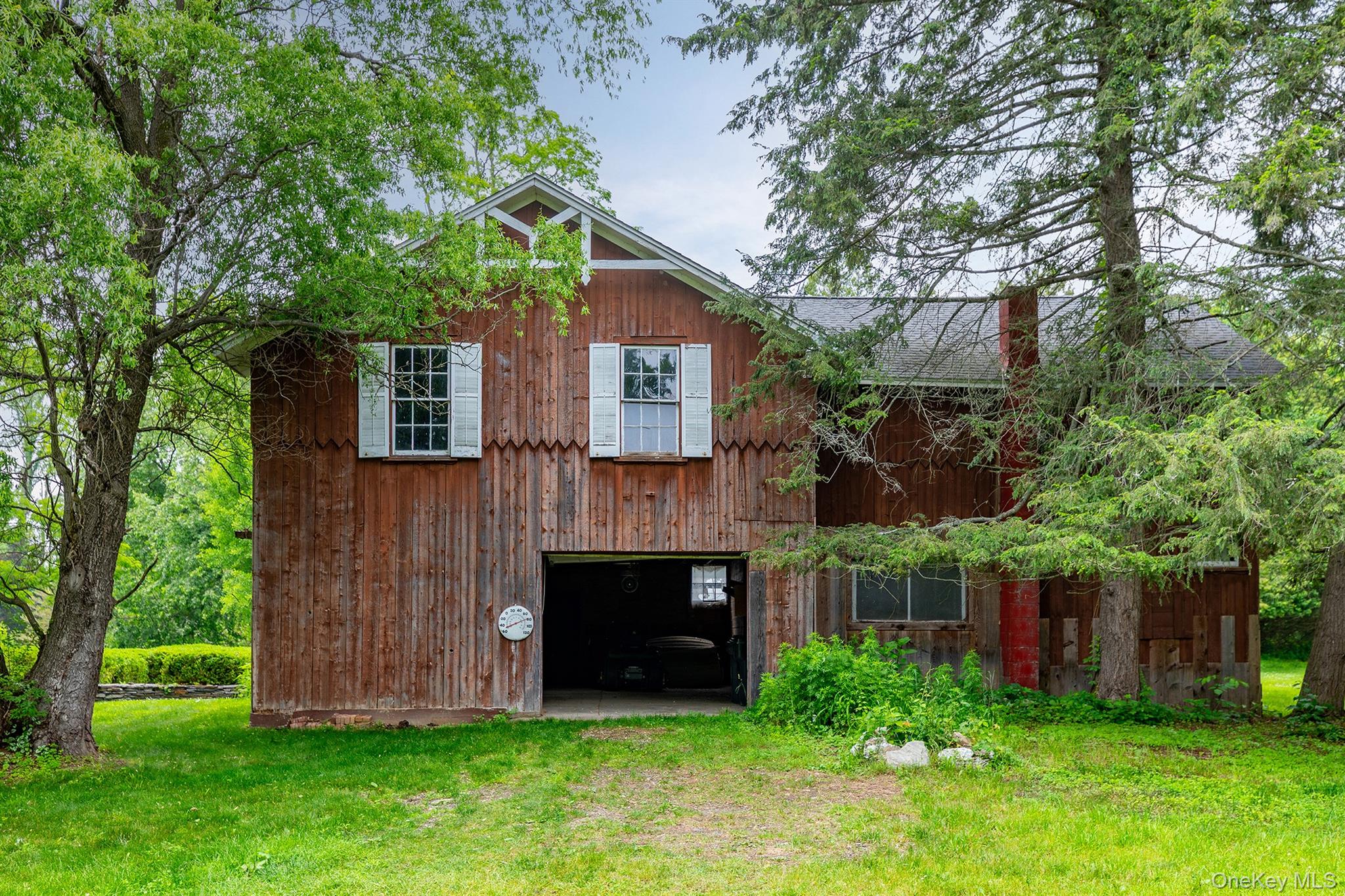 202 Buckwheat Road Hudson, NY 12534 - Photo 34 of 49 a front view of a house with garden