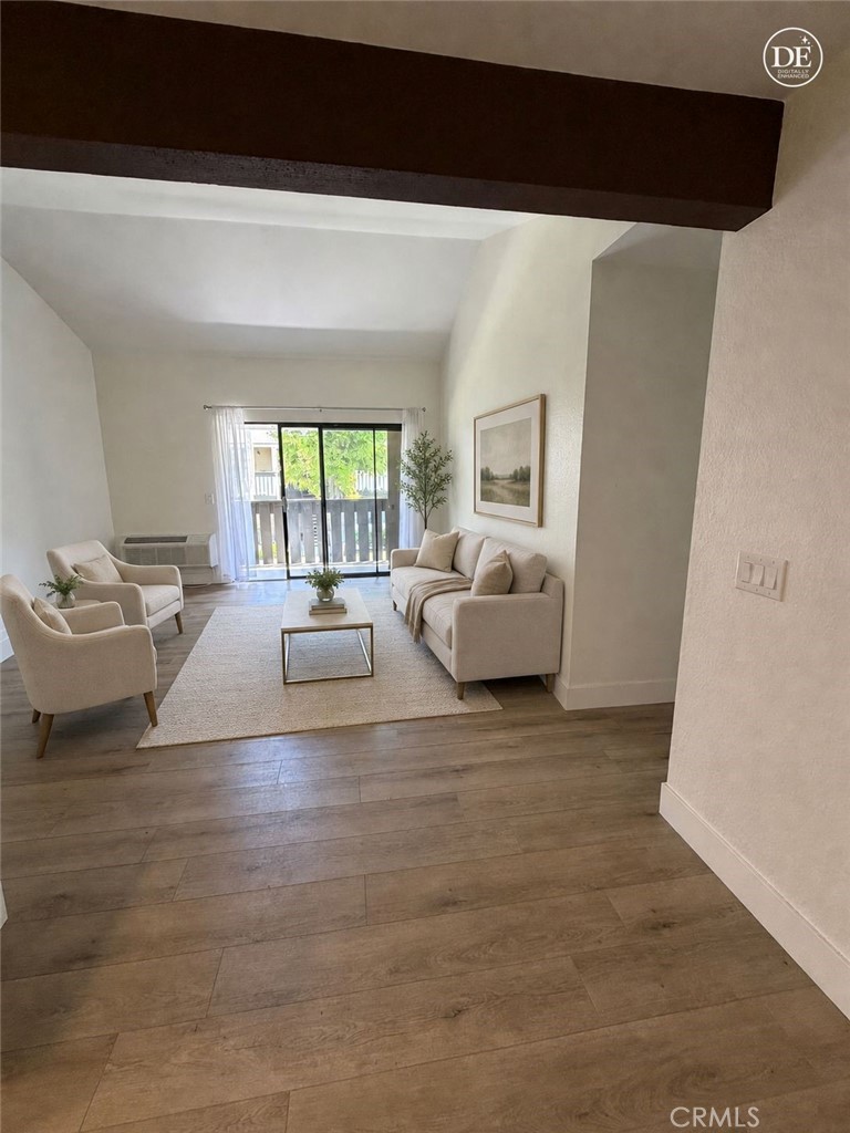 3535 Banbury Drive, Unit 178 Riverside, CA 92505 - Photo 7 of 26 a living room with furniture and a large window