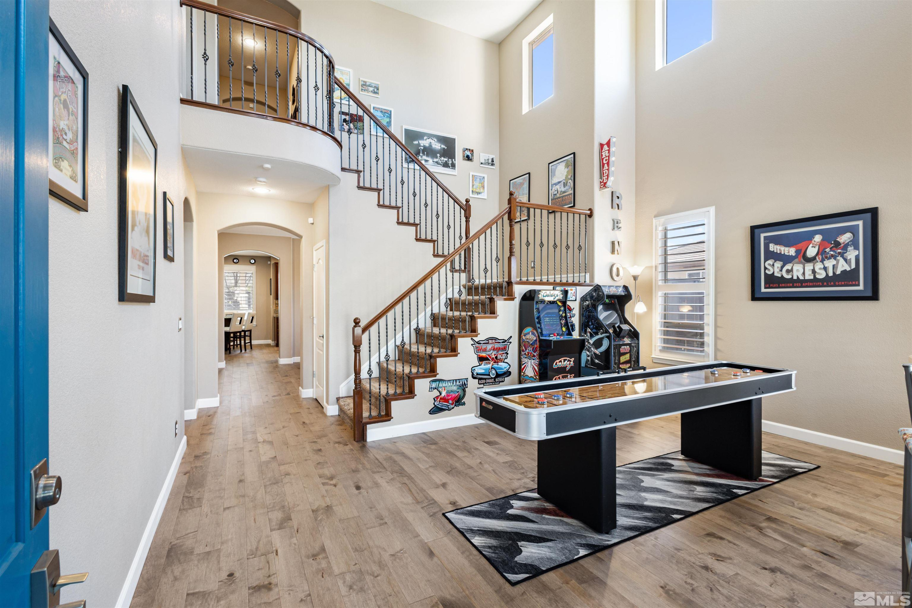 14025 Tagor Road Reno, NV 89521 - Photo 4 of 39 a living room with furniture and wooden floor